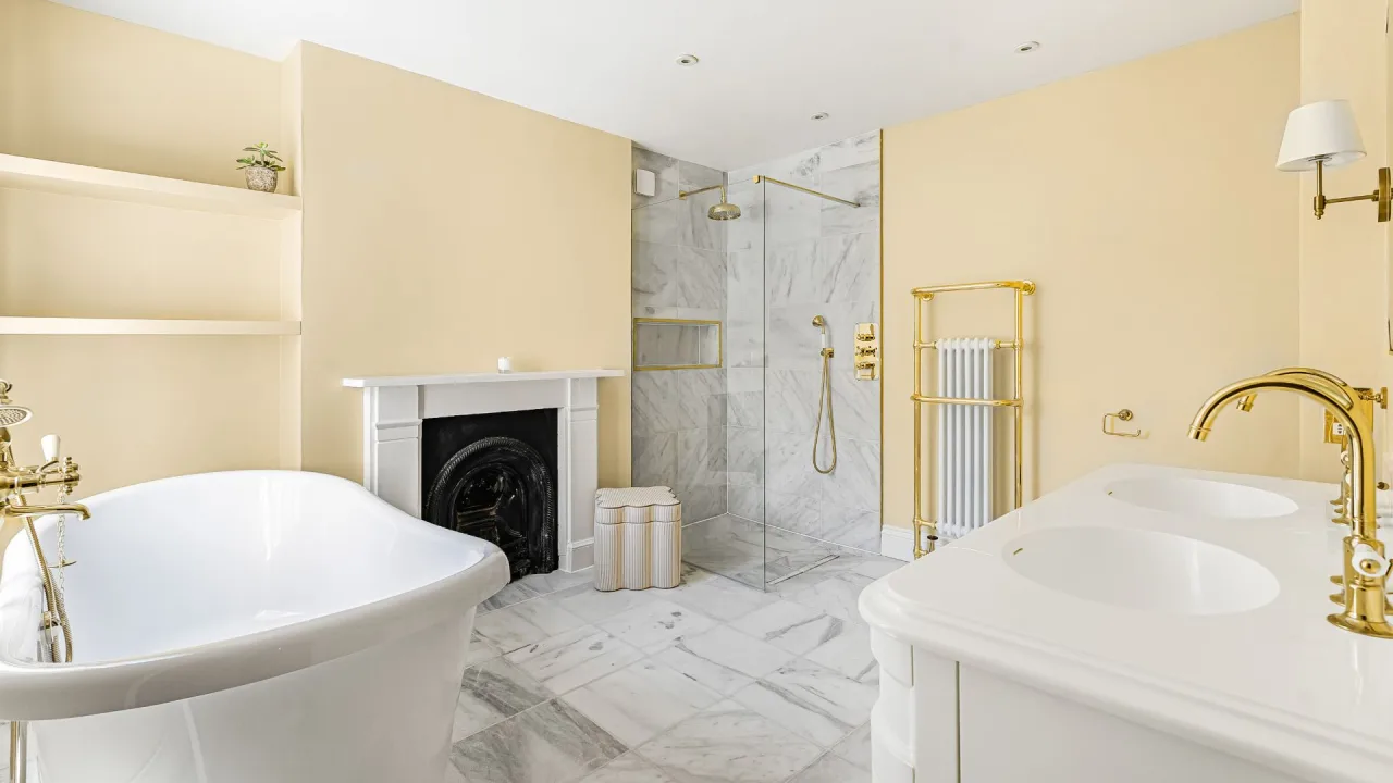 After - The Heritage Gold & Marble Bathroom