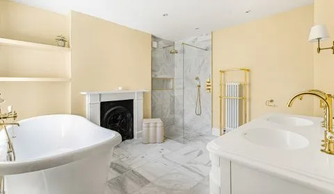 After - The Heritage Gold & Marble Bathroom