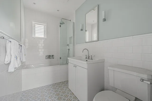 Timeless Kids Bathroom: White and Berlin Motif