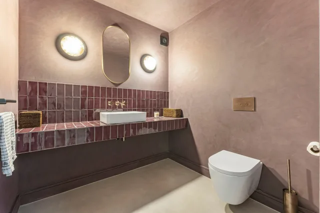 The Bordeaux & Bronze Cloakroom